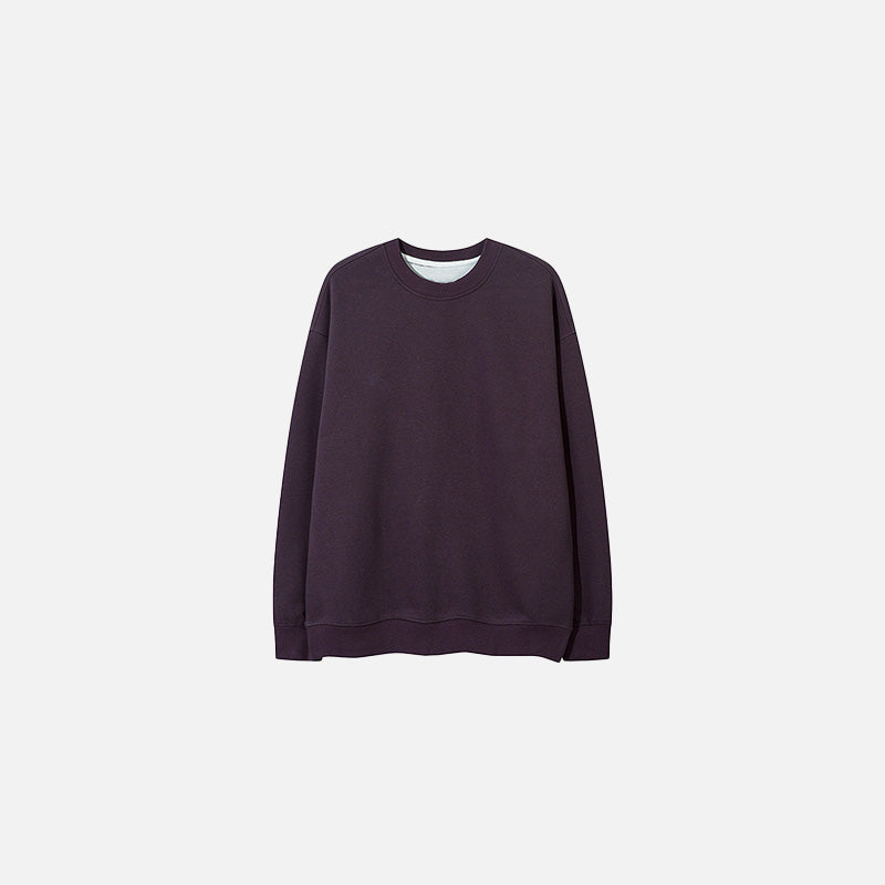 Front view of the purple Classic Crewneck Sweater in a gray background