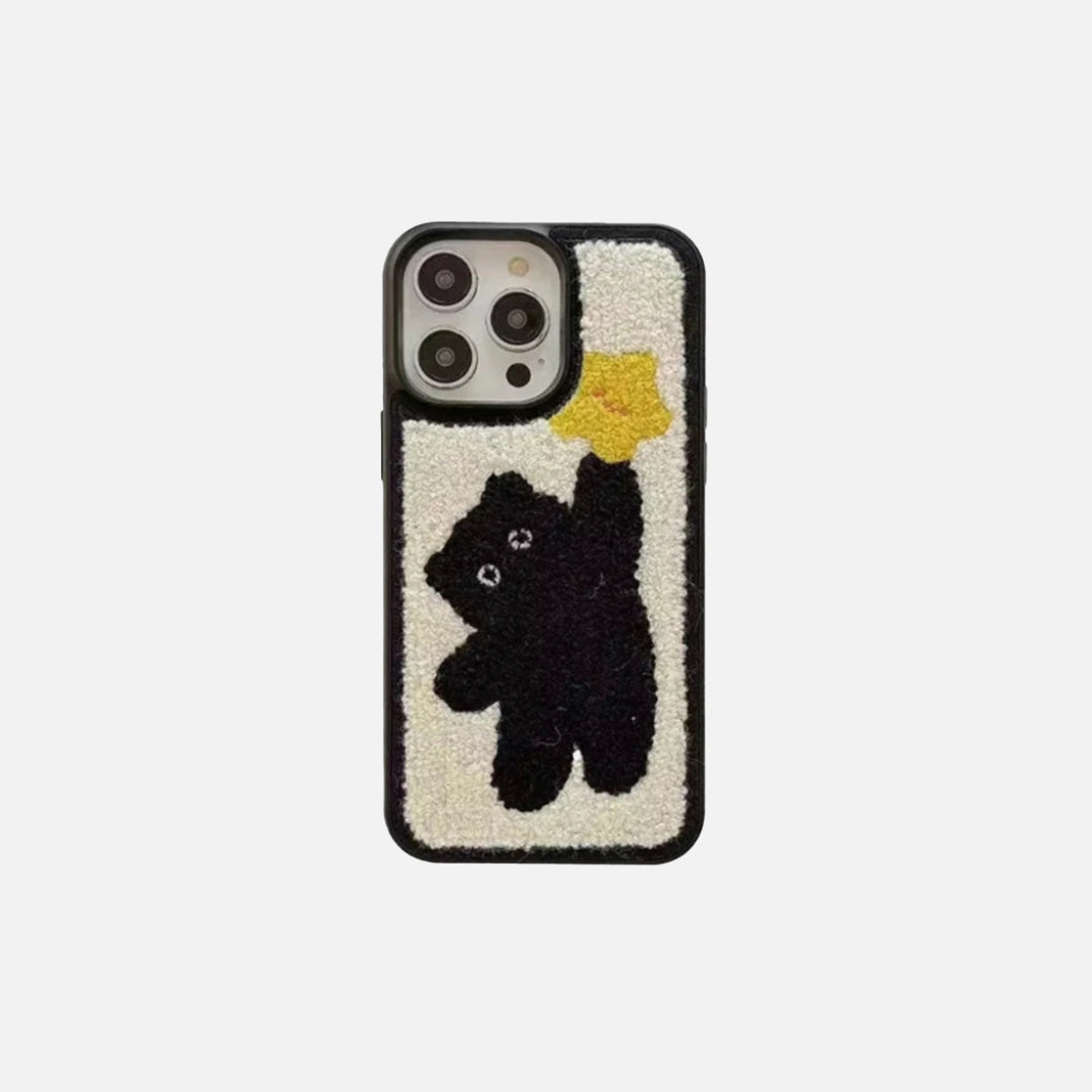 Front view of the black Dreamy Charm Case in a gray background