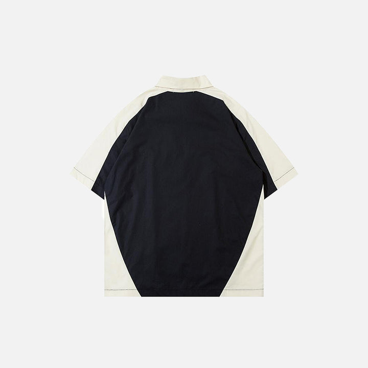 Back view of the black Polo Splicing Color Zip-up T-shirt in a gray background 