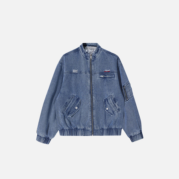 Front view of the blue Y2k Washed Cowboy Zip-up Jacket in a gray background 