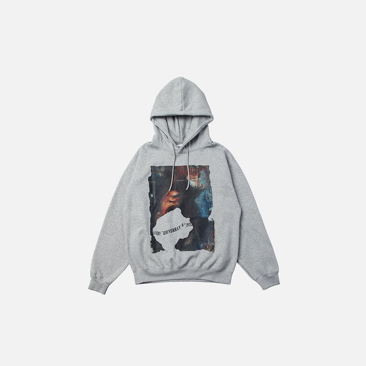 Front view of the gray Oversized Loose Graphic Hoodie in a gray background 
