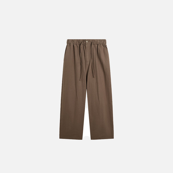 Front view of the walnut Loose Solid Color Baggy Pants  in a gray background 