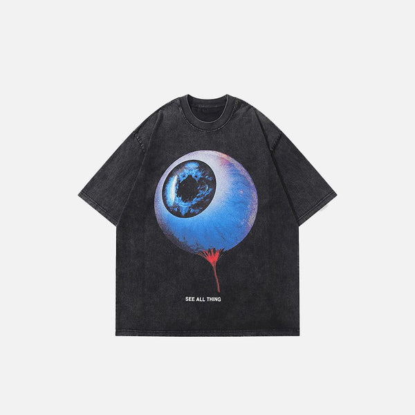Front view of the black Loose Washed Graphic Eye T-Shirt in a gray background 