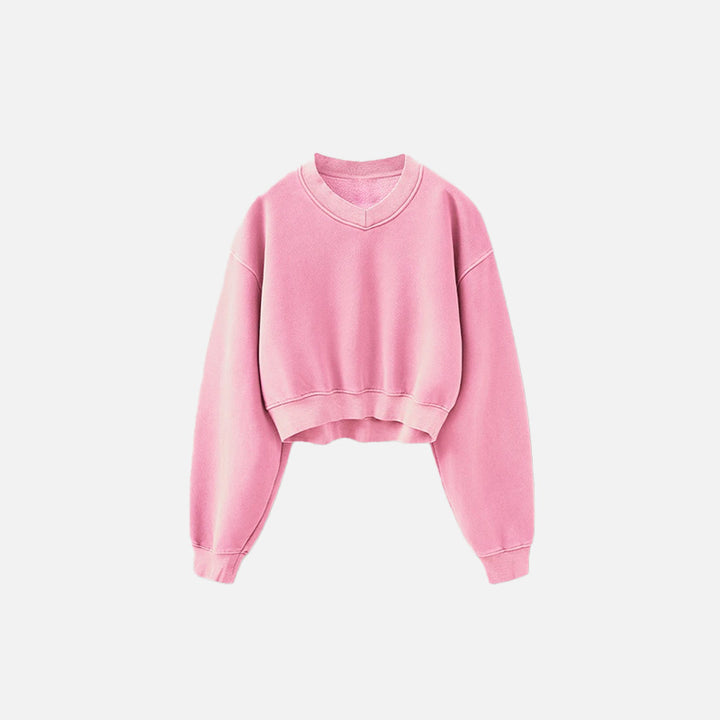 Front view of the pink Women's Fleece Cropped Sweatshirt in a gray background