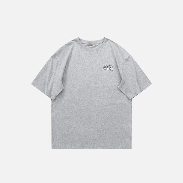 Front view of the grey Loose Short-sleeved Motivate T-Shirt in a gray background 