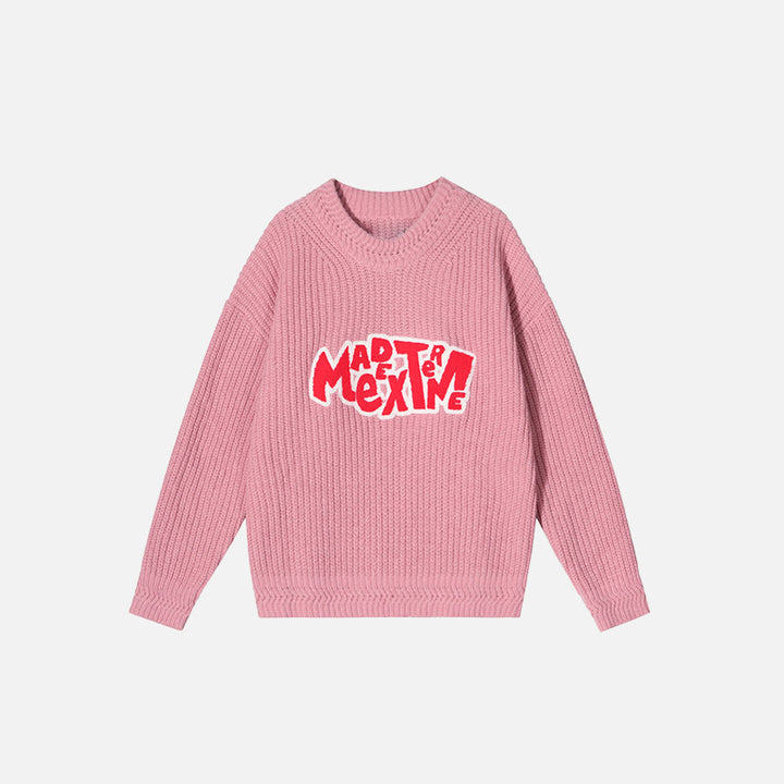 Front view of the pink Vintage Embroidered Knitted Sweater in a gray background 