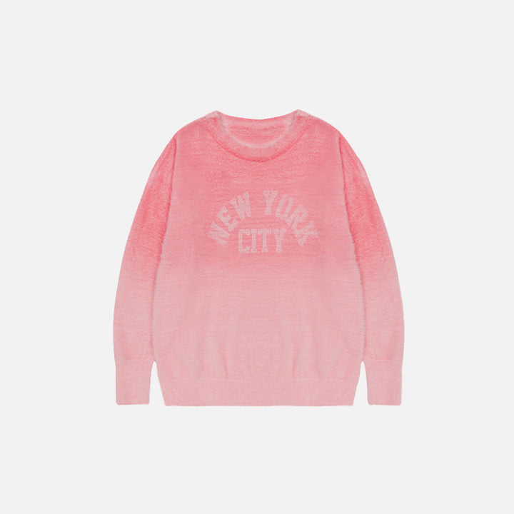 Front view of the pink Fluffy Fleece New York Sweater in a gray background 