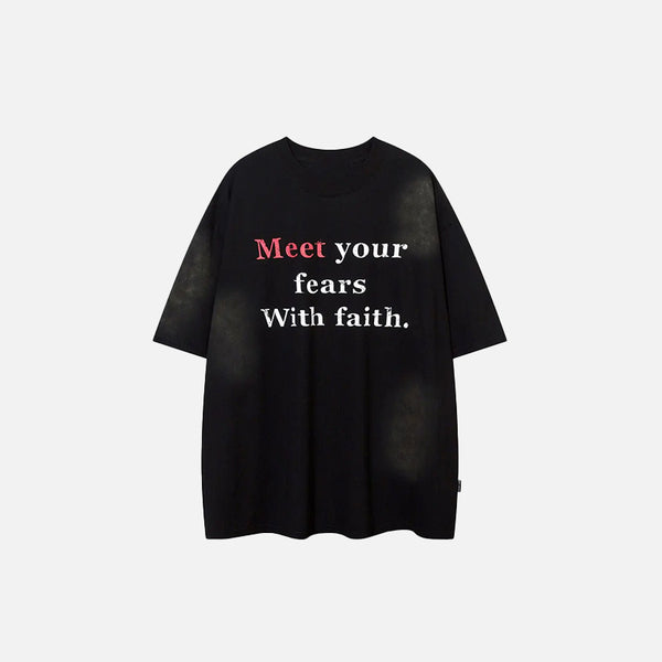 Front view of the black "Meet Your Fears With Faith" Printed T-Shirt in a gray background 