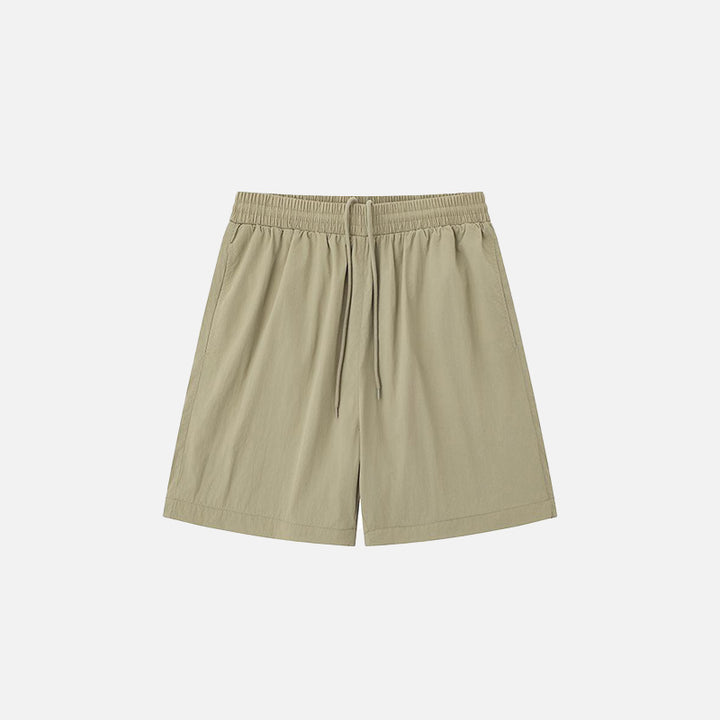Front view of the khaki Loose Solid Color Sports Shorts in a gray background 