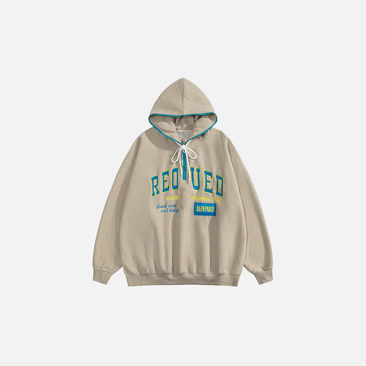 Front view of the apricot Oversized Loose Zip-up Hoodie in a gray background 