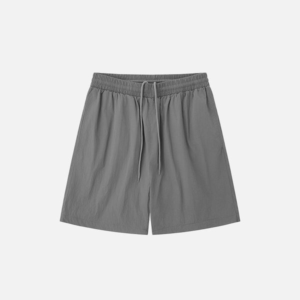 Front view of the grey Loose Solid Color Sports Shorts in a gray background 