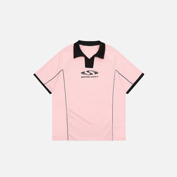 Front view of the pink "Some Lucky" Printed Sports Polo T-shirt in a gray background
