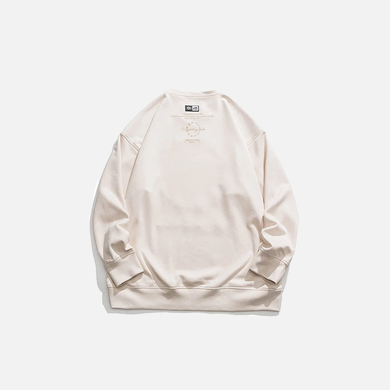 Back view of the beige Loose  Embroidered Sweatshirt in a gray background