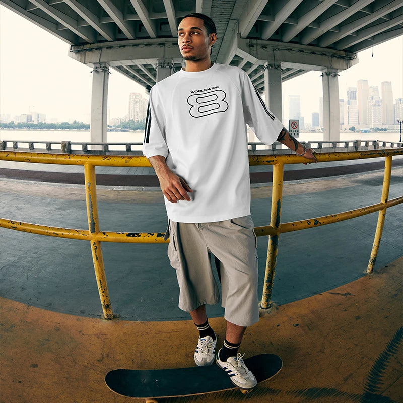 Model wearing the white Y2K Infinity T-Shirt 