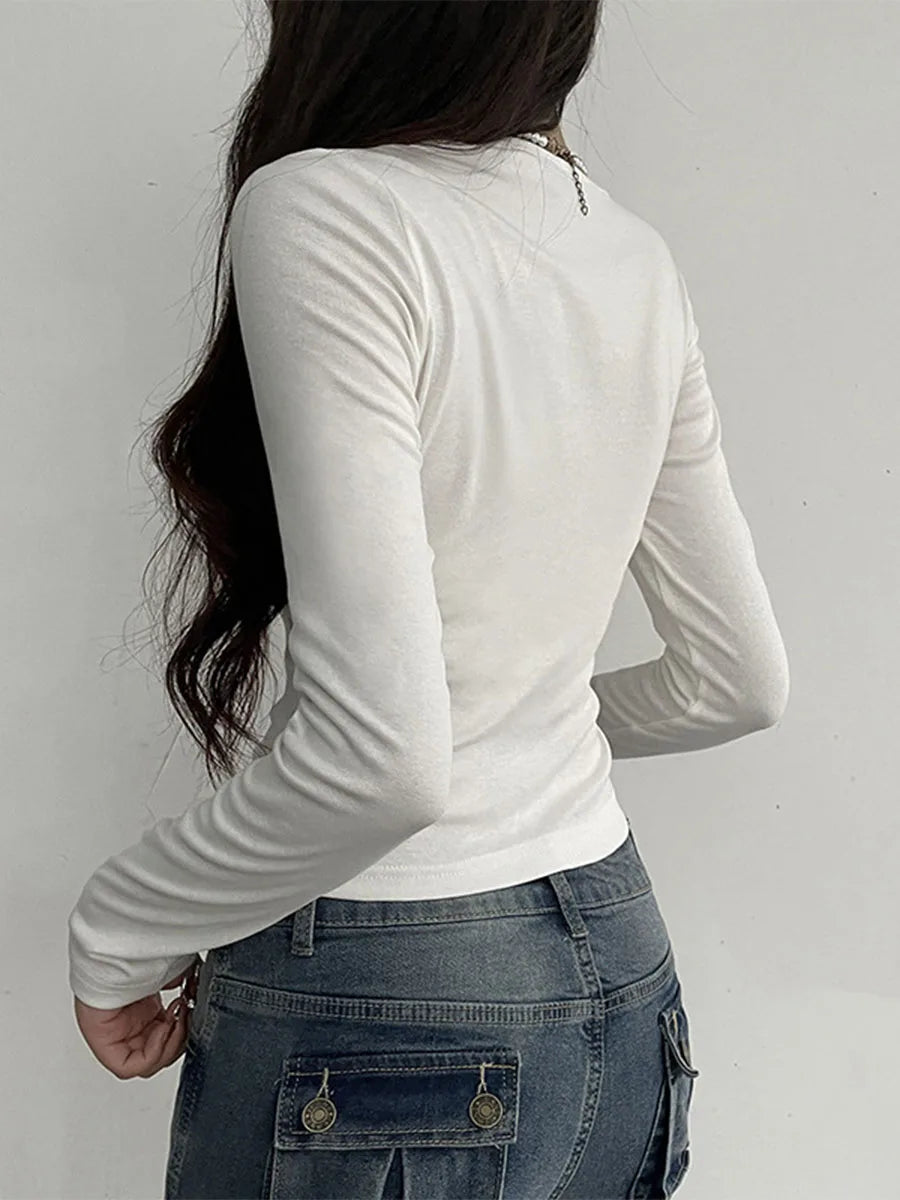 Model wearing the white Bust Bow Ruched CoquetteTop 