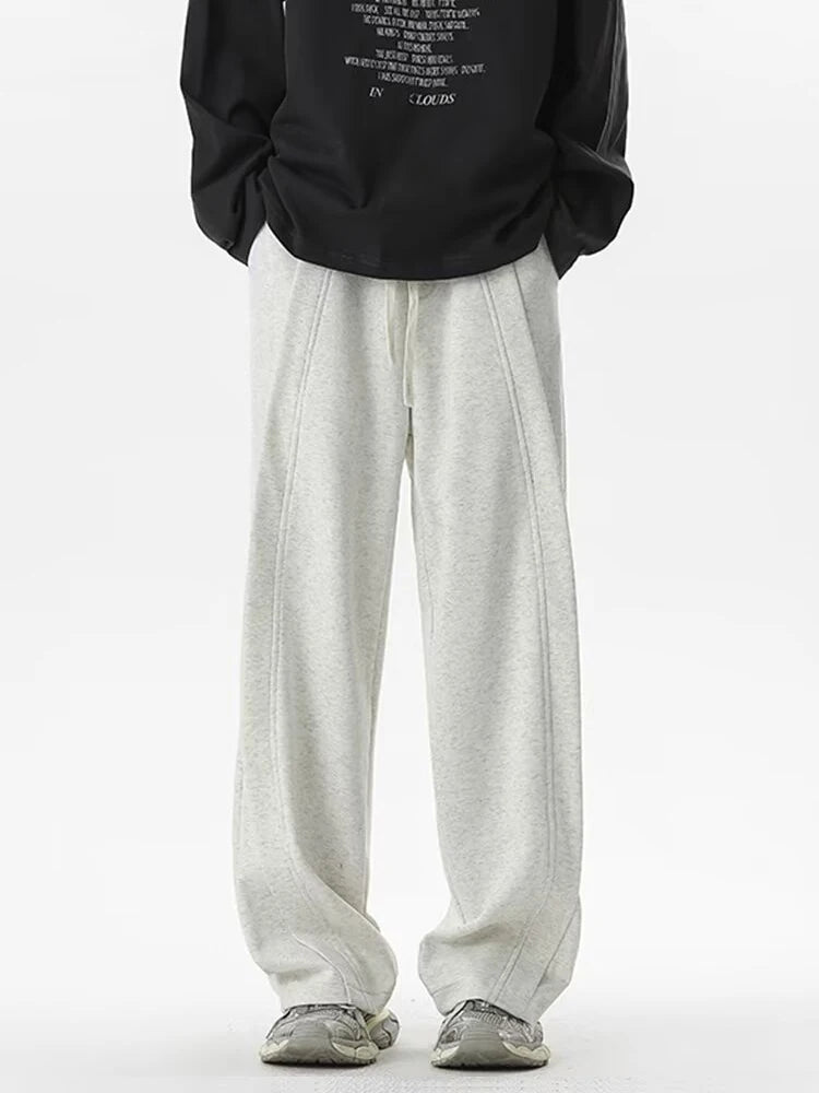 Front view of the gray Loose Fit Pleated Sweatpants