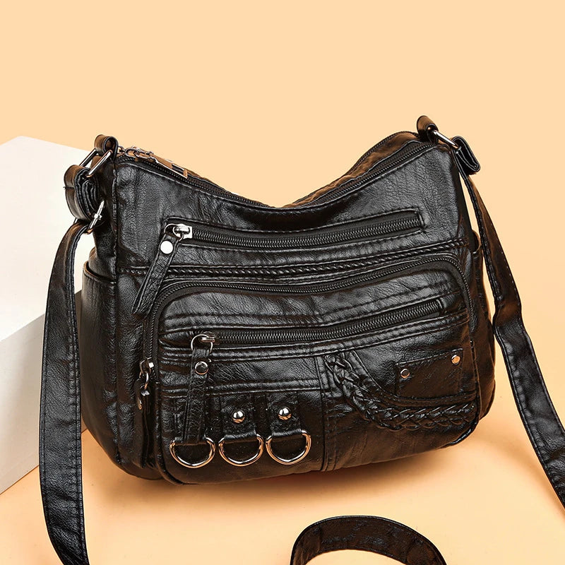 Front view of the black Braided Multi-Pocket Bag 