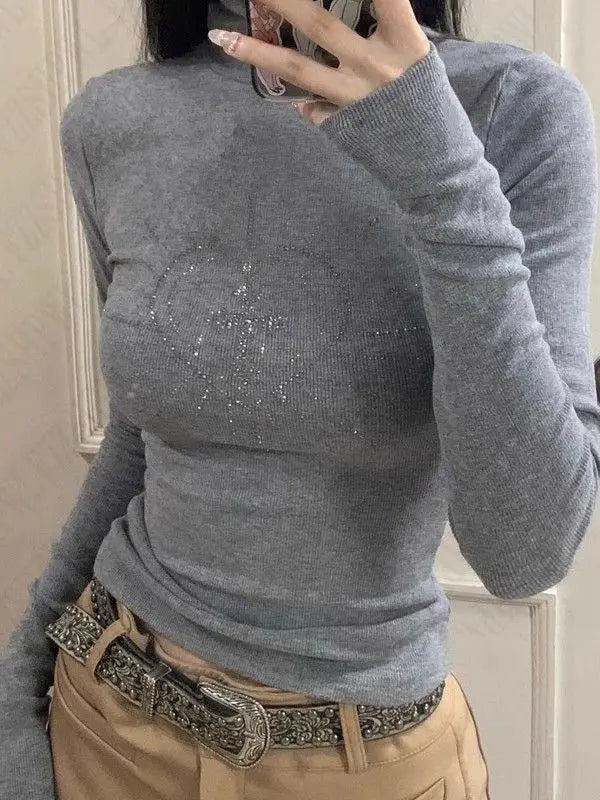 Model wearing the gray Modern Maven Top