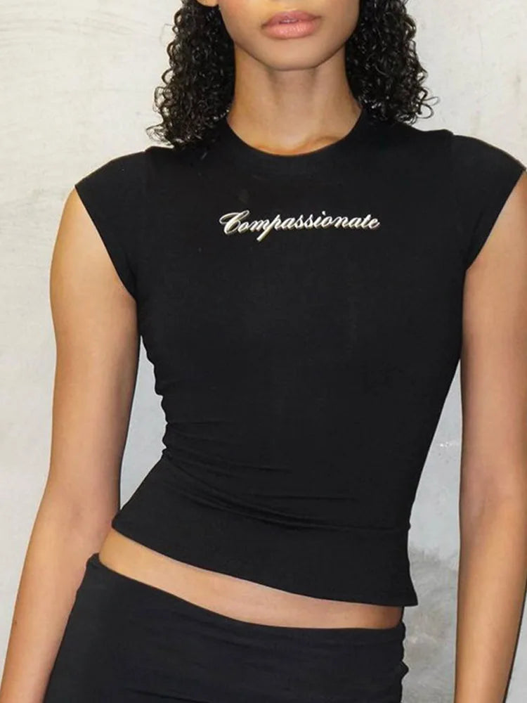 Model wearing the black Empathetic Fitted T-Shirt