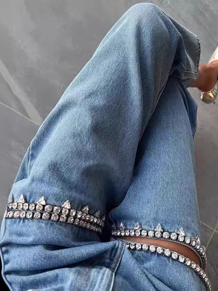 Model wearing the blue Embellished Baddie Cut-Out Jeans