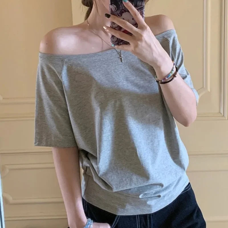 Model wearing the gray Relaxed Off-Shoulder T-Shirt 
