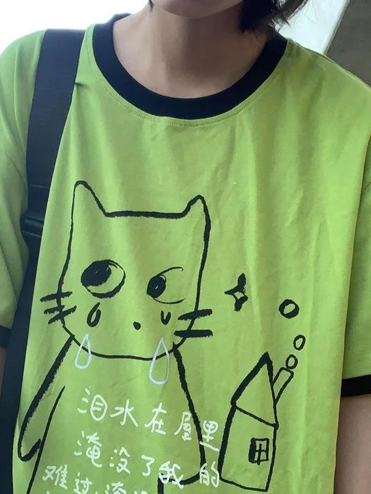 Model wearing the green Whimsical Kitty T-Shirt