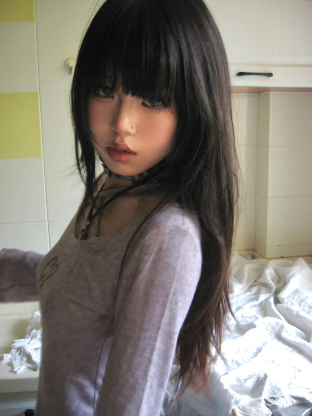 Model wearing the purple Criss-Cross Back Bell Sleeve T-Shirt