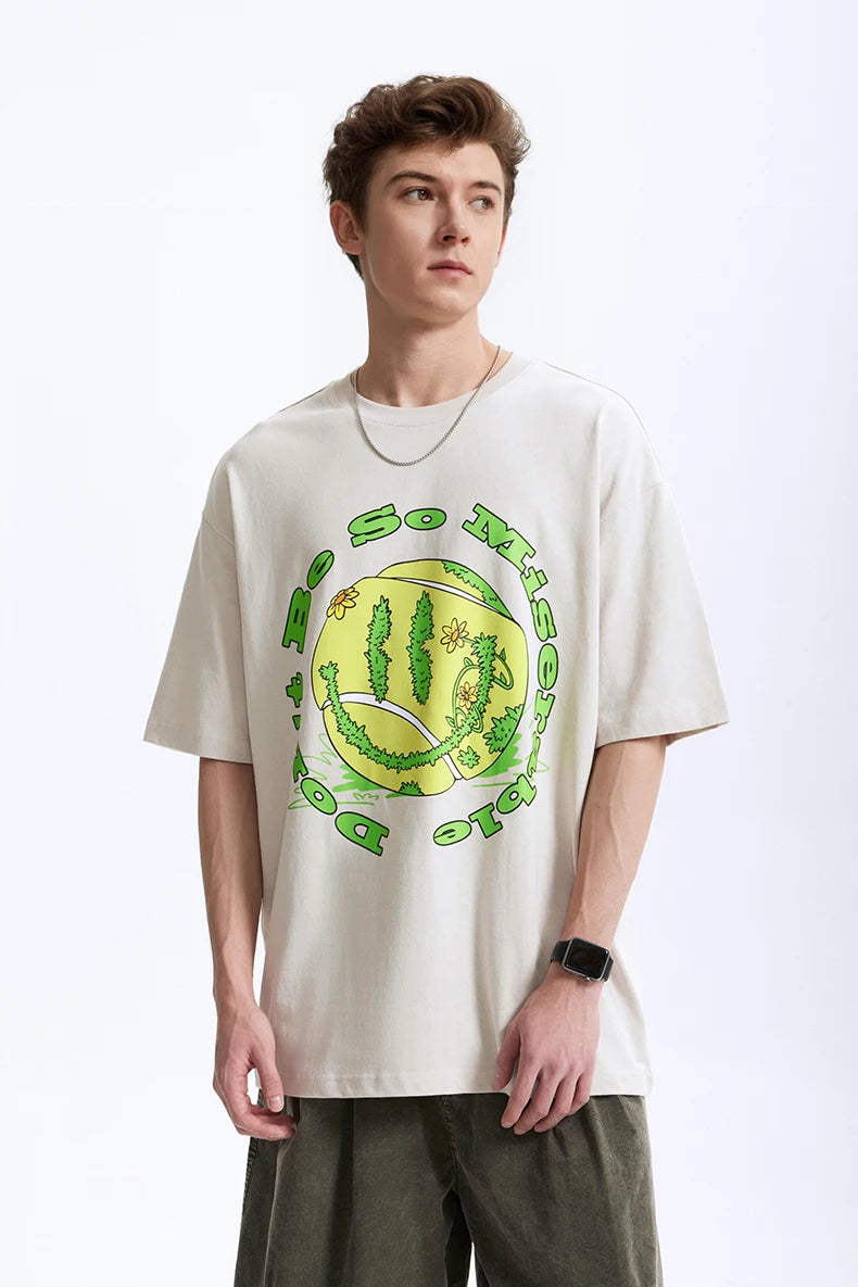 Model wearing the beige Serve Up Positivity T-Shirt