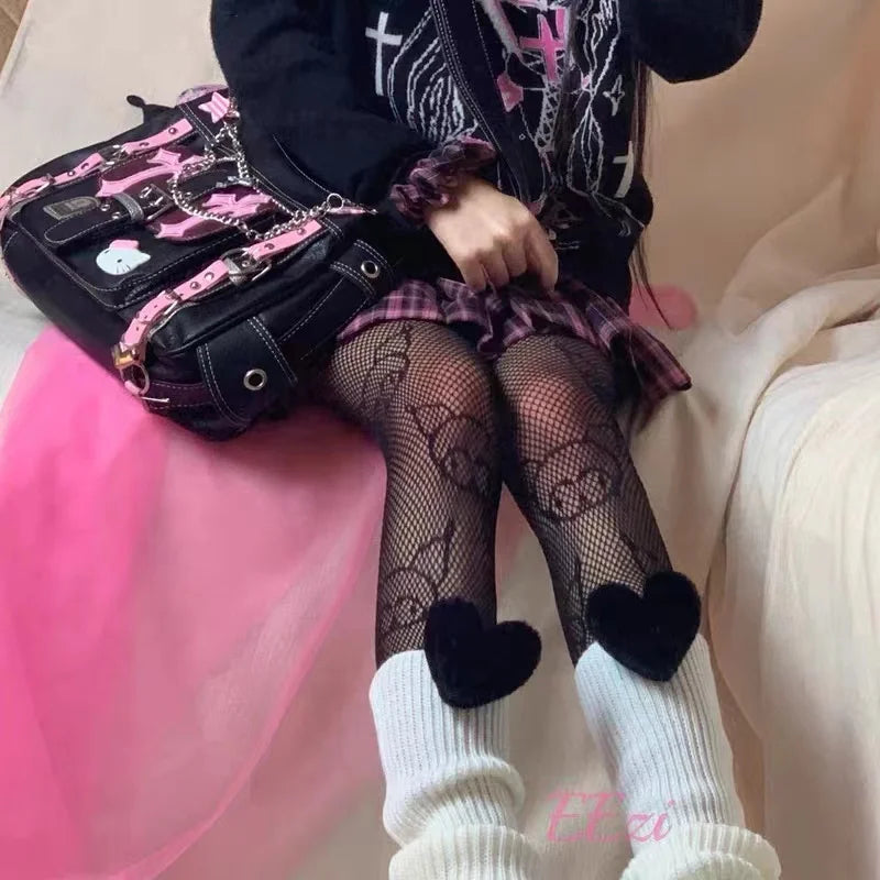 Model wearing the black Gothic Charm Hello Kitty Handbag 