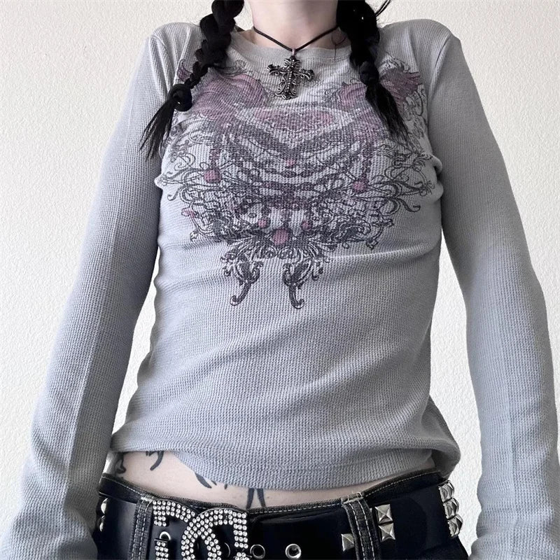 Model weaing the ivory Ethereal Skull Embrace T-Shirt