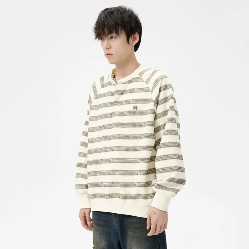 Model wearing the apricot Striped Long-Sleeve Sweatshirt