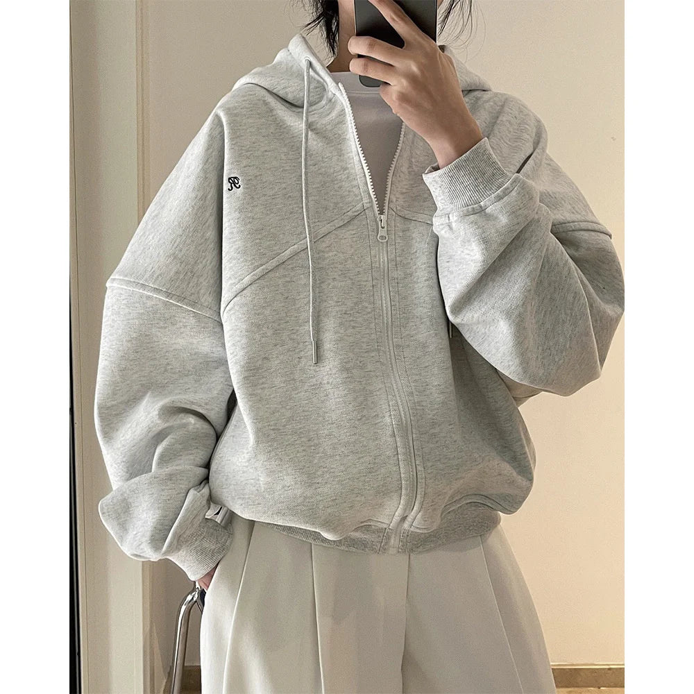 Front view of the light gray Explorer's Dream Hoodie in a gray background 