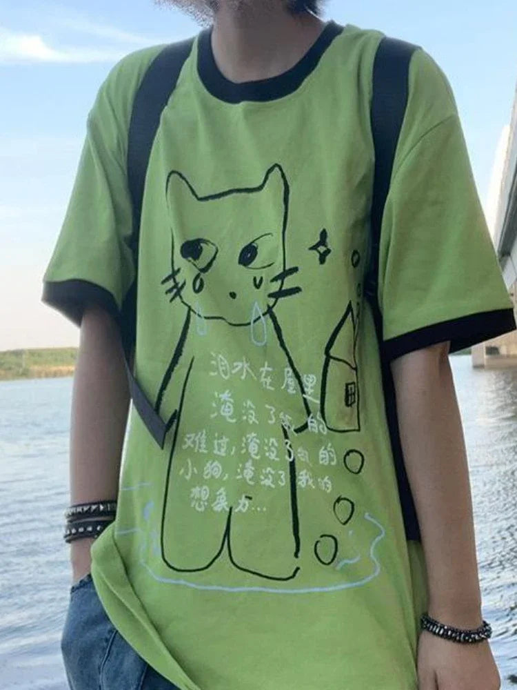 Model wearing the green Whimsical Kitty T-Shirt