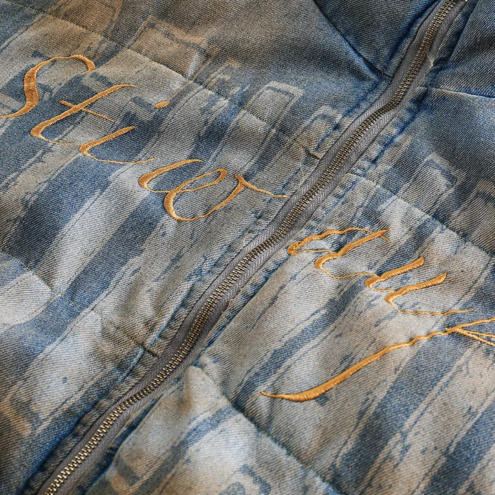 Details of the Vintage Washed Dye Denim Jacket showing the zipper and some letters print