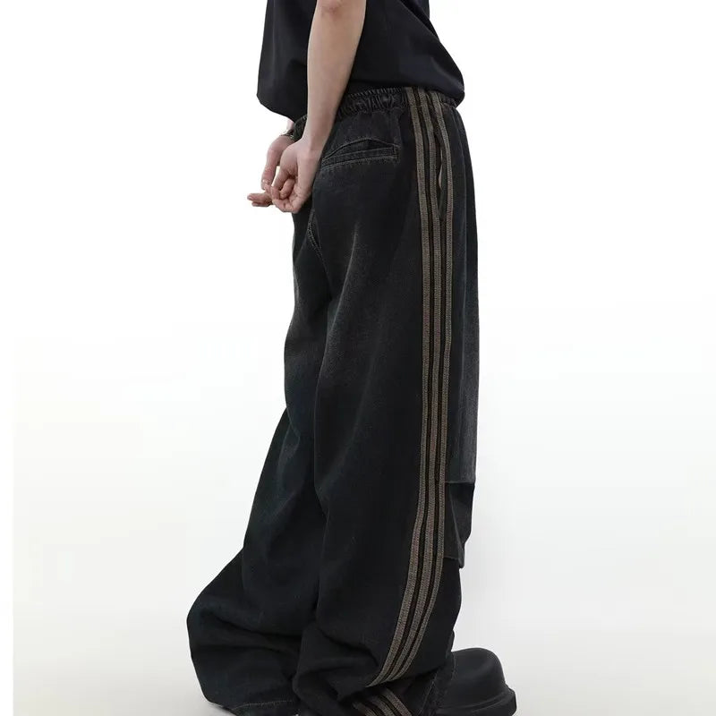 Model wearing the black Velvet Street Baggy Pants