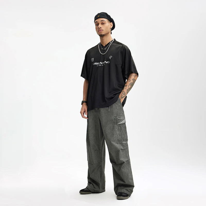 Model wearing the grey Wanderer's Utility Pants