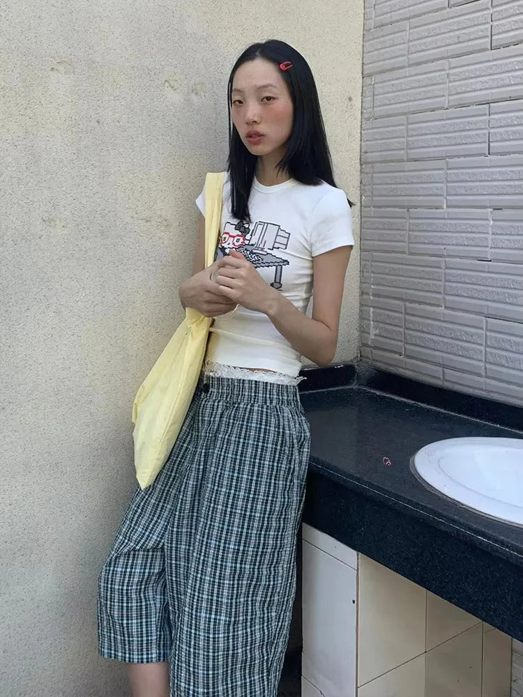 Model wearing the white Graphic Office Lady T-Shirt