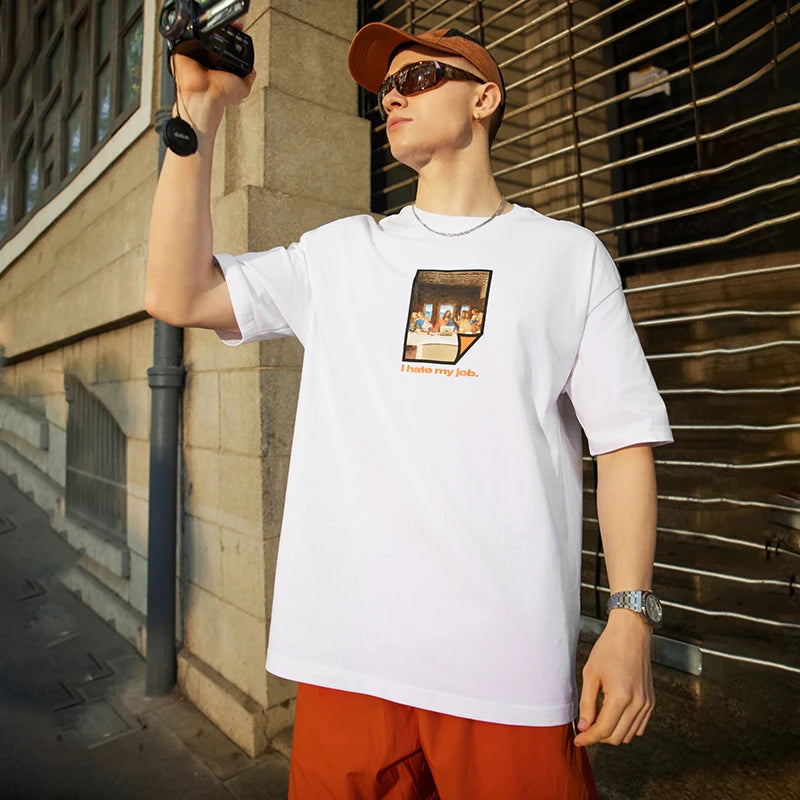 Model wearing the white I Hate My Job Graphic T-Shirt