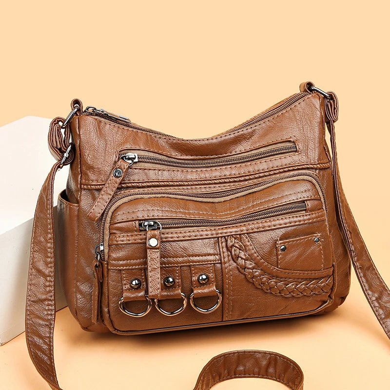 Front view of the brown Braided Multi-Pocket Bag 