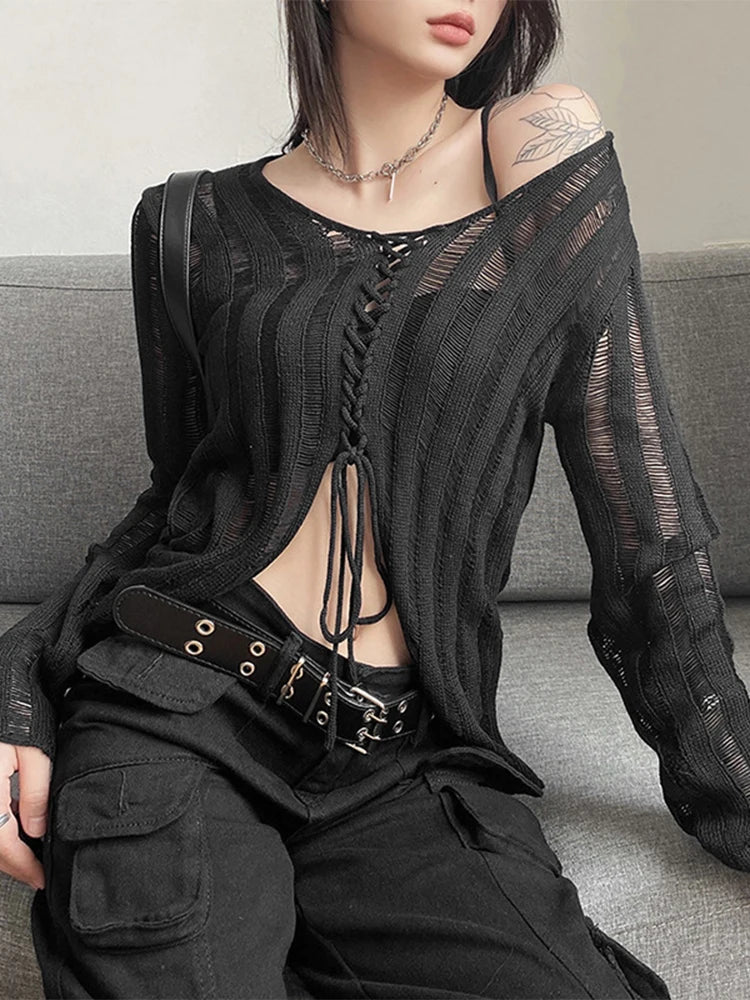 Model wearing the black Y2K Lace-Up Knit Top
