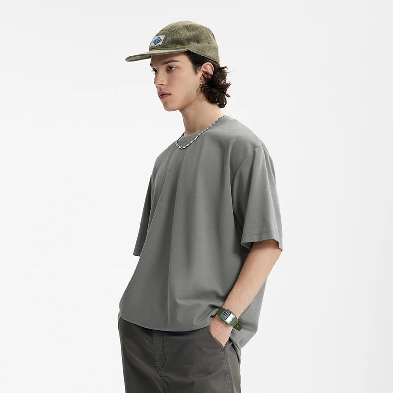 Model wearing the light gray Essential Everyday T-Shirt