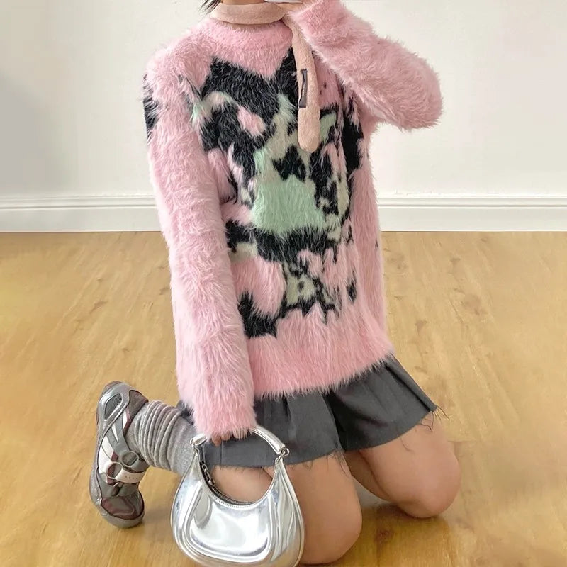 Model wearing the pink Soft Punk Oversized Sweater
