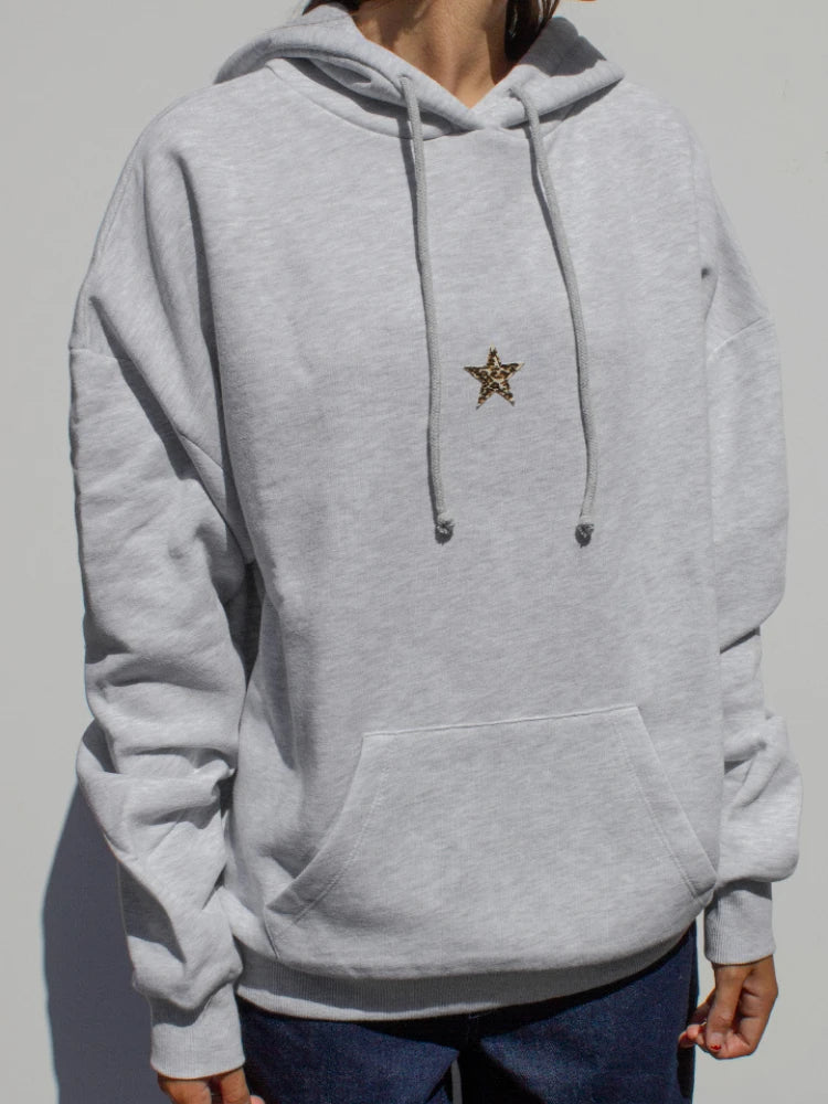 Model wearing the gray Y2K Star Charm Hoodie