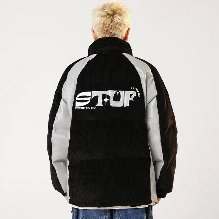 A model wearing the black Corduroy Patchwork Padded Retro Puffer Jacket while showing the back view