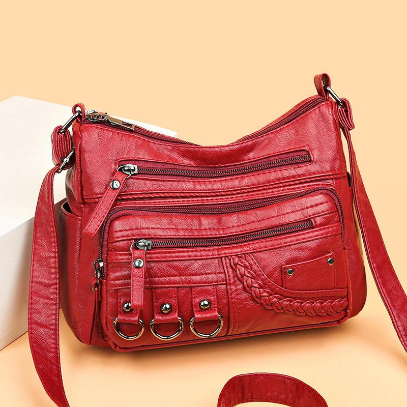 Front view of the red Braided Multi-Pocket Bag 