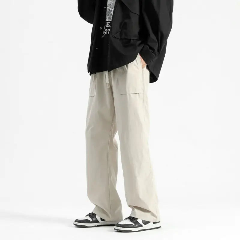 Model wearing the beige Wide-Leg Drawstring Cargo Pants