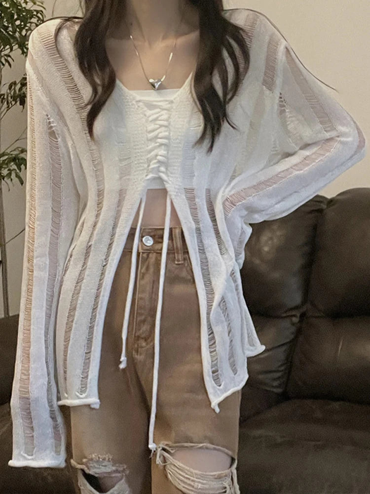 Model wearing the white Y2K Lace-Up Knit Top