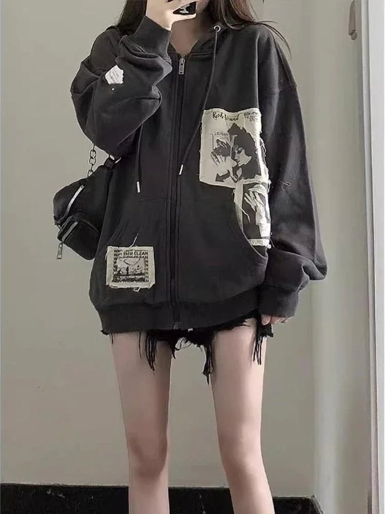 Model wearing the black Geometric Pattern Zip-Up Sweatshirt