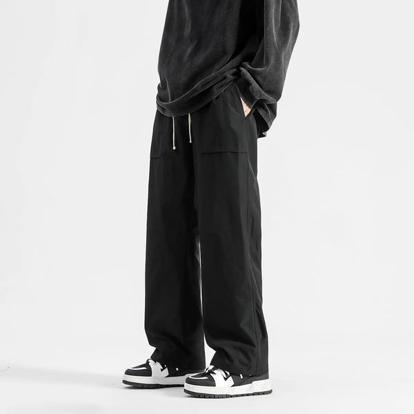 Model wearing the black Wide-Leg Drawstring Cargo Pants