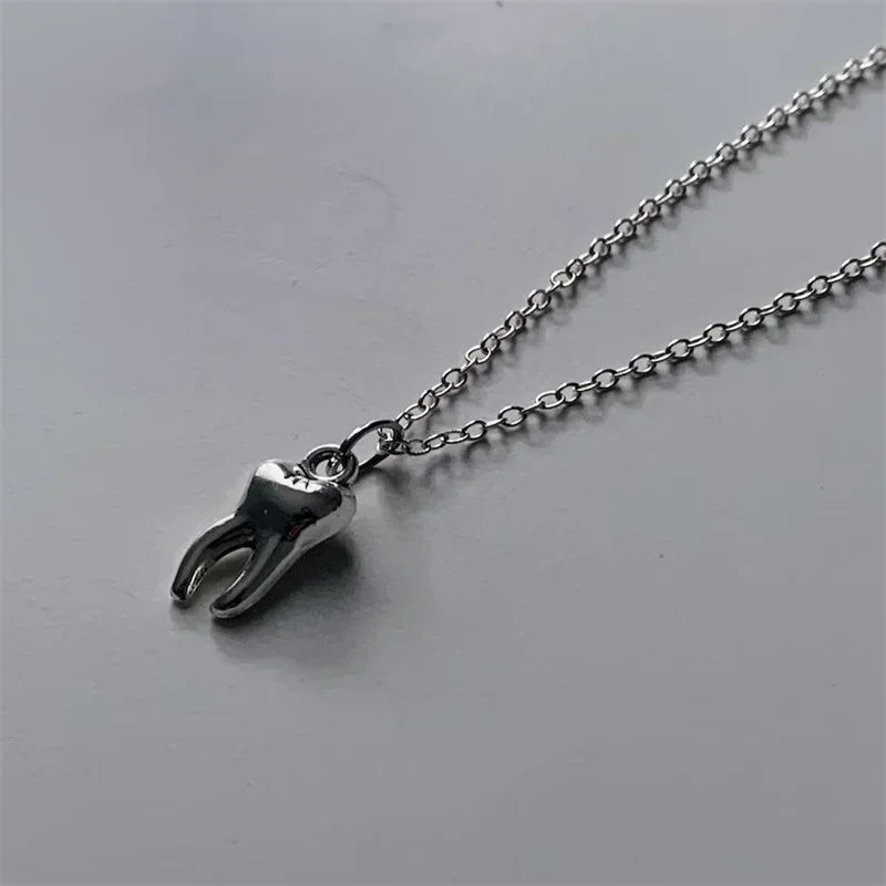 Front view of the Tooth Pendant Necklace 